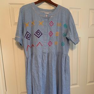 Vintage denim dress with bold pattern.